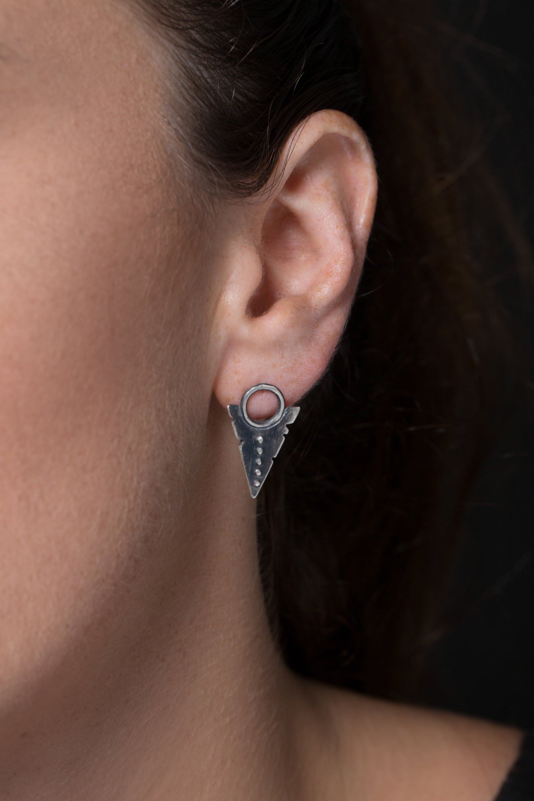 A pair of silver oxidized and brushed finish dotted path earrings