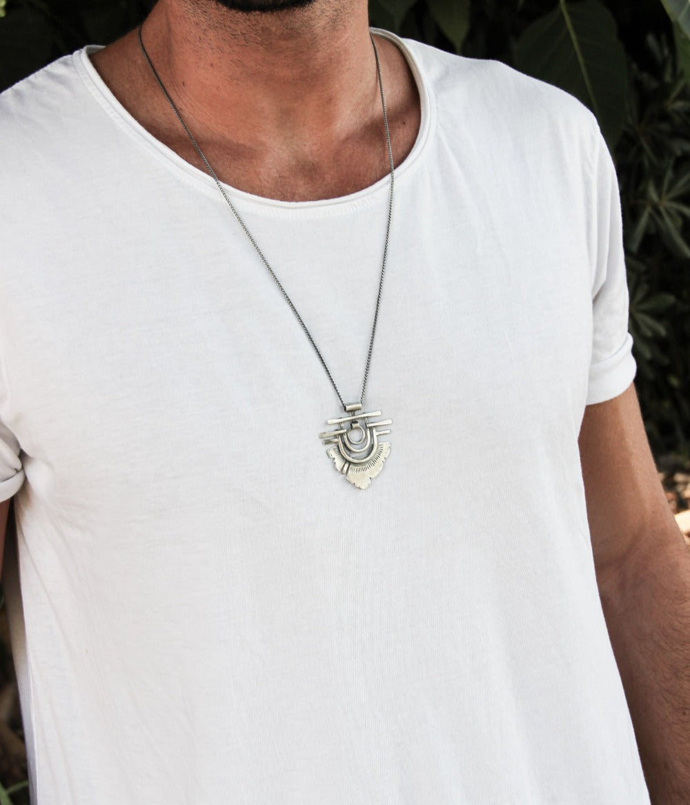 Men wearing silver shelly ganz touch the fire necklace 