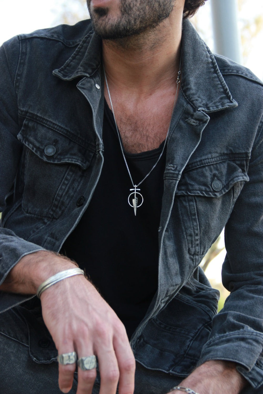 men wearing silver rings and sharpen mind silver necklace