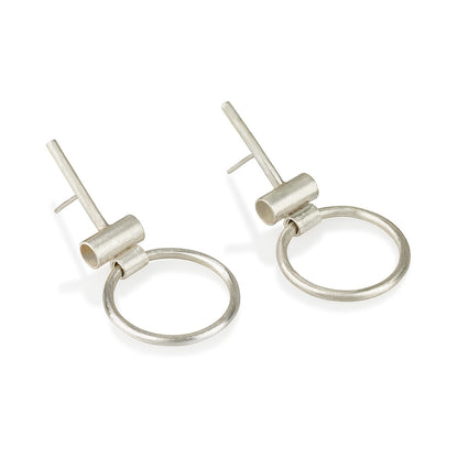 A pair of silver hoop earrings with a brushed finish, featuring a simple and elegant design.