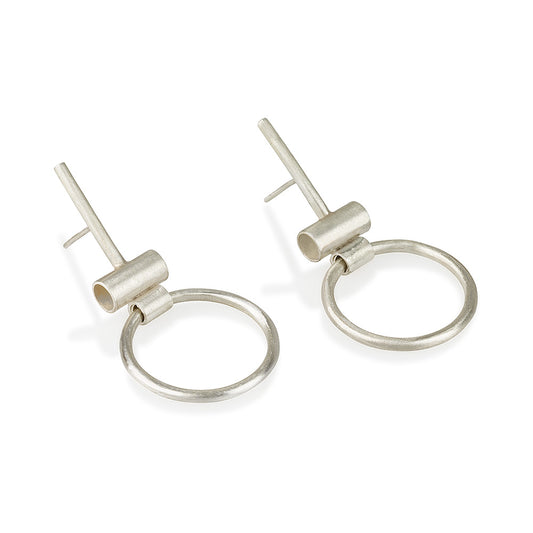 A pair of silver hoop earrings with a brushed finish, featuring a simple and elegant design.